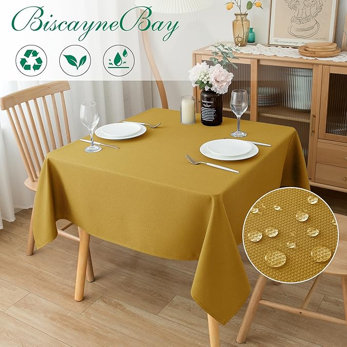 Biscaynebay Textured Fabric Christmas Square Table Cloth 60x60 Inches, Gold Water Resistant Tablecloths for Dining, Kitchen, Wedding and Parties etc. Machine Washable