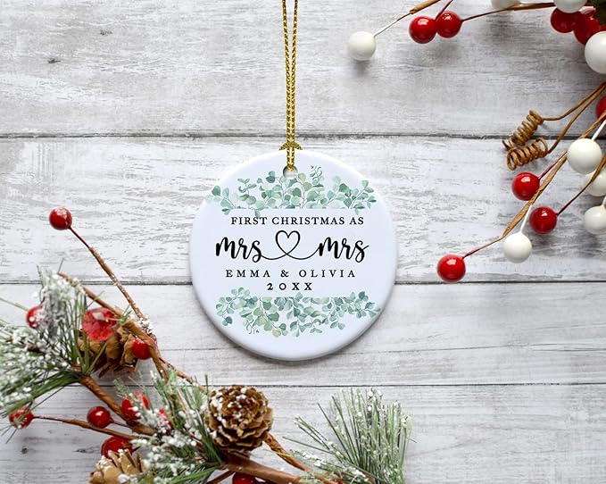 Andaz Press Personalized Our First Christmas As Mrs. & Mrs. 2025 Christmas Ornaments Greenery Eucalyptus 2.8" Round Porcelain Ceramic Lesbian Married Couple Gay Women Newlyweds Keepsake 1-Pack